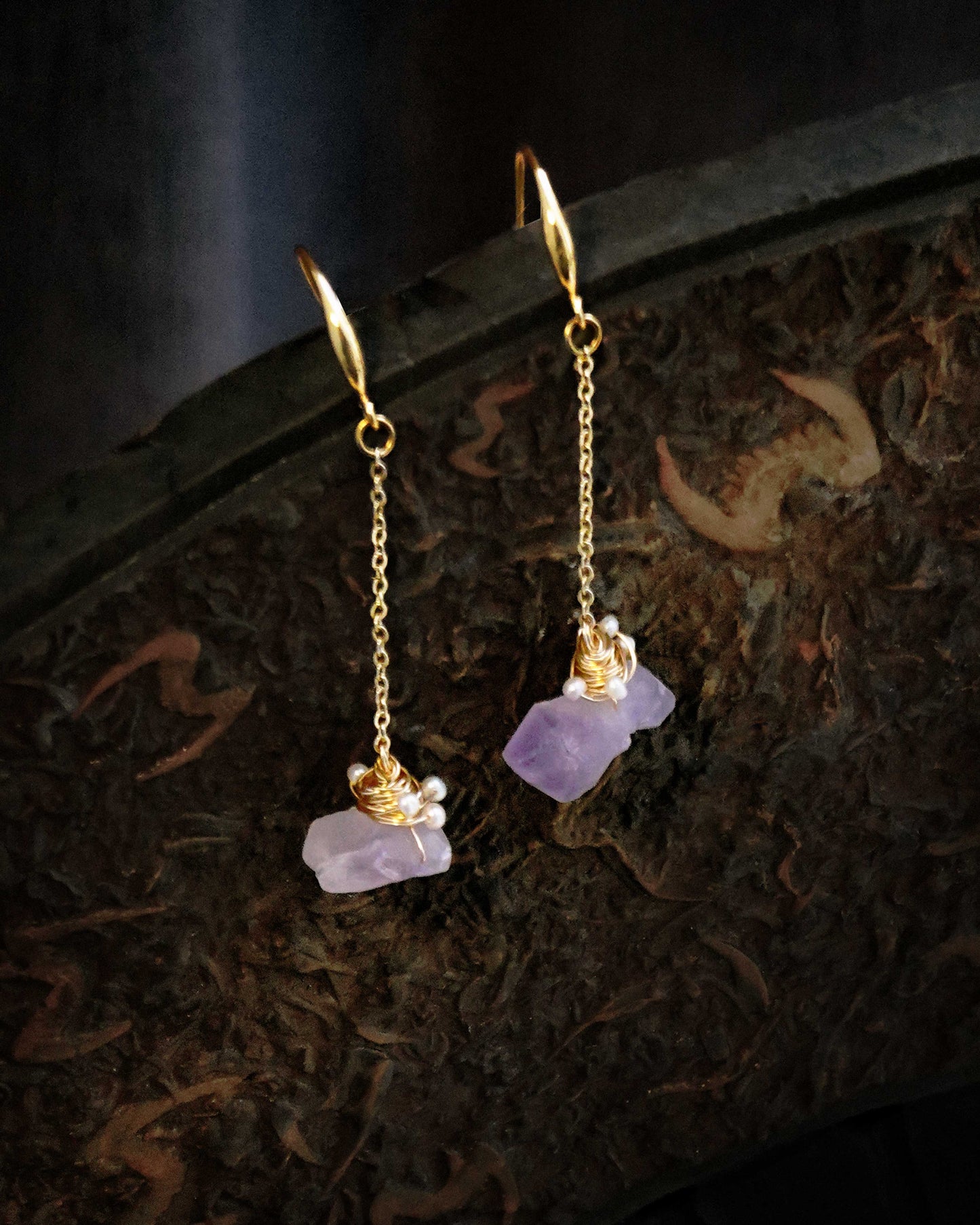 Close-up of the Amethyst Pearl Handcrafted Wire Wrapping Dangle Earrings, highlighting the artistry of the wire wrapping and the beauty of the amethyst and pearls