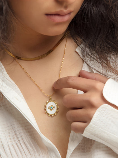 Model wearing the Spiritual Symbol Layered Golden Necklace, showing the elegance and symbolism of the layered design