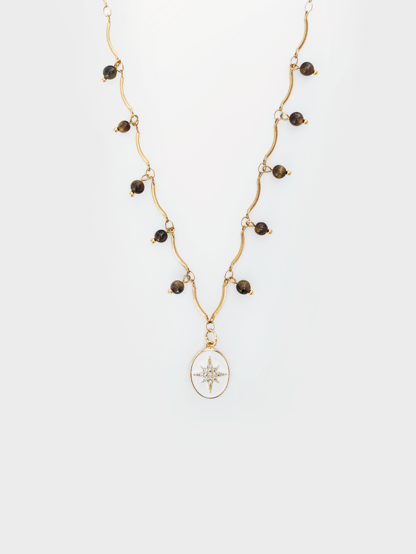 A stunning Yellow Tiger's Eye Star Charm Choker Necklace, featuring unique star-shaped charms with a glowing golden hue, perfect for adding a touch of elegance and mysticism to any outfit