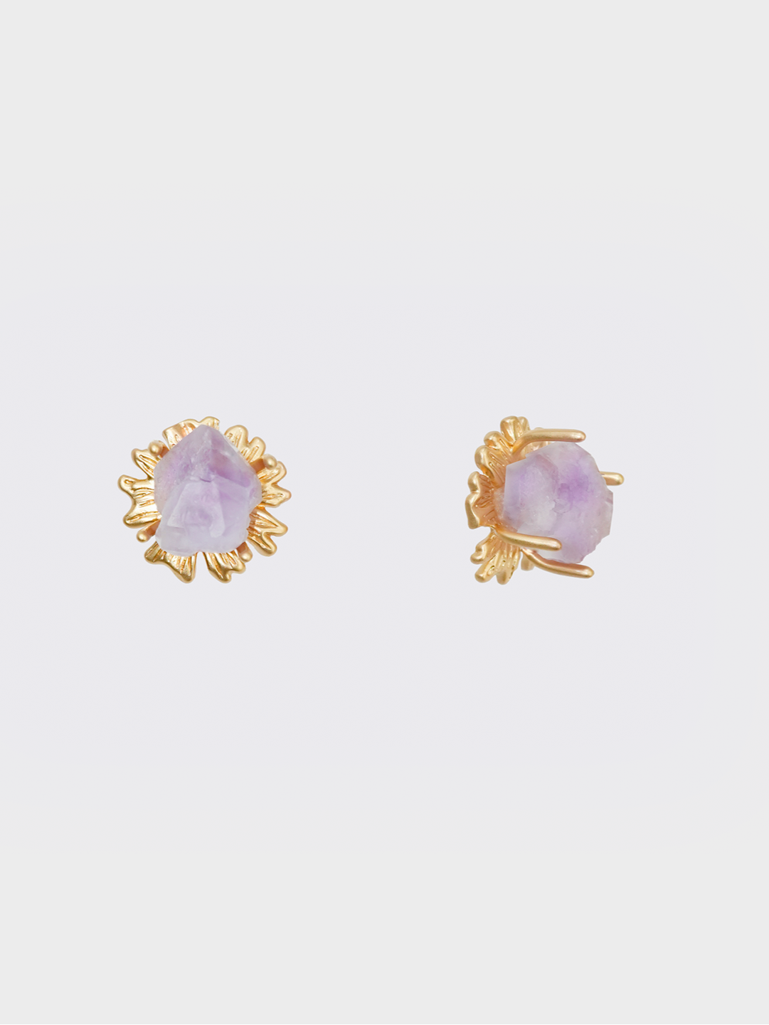 A front view of the Amethyst Sunflower Golden Stud Earrings, showcasing the intricate sunflower design with amethyst center stones set in gold