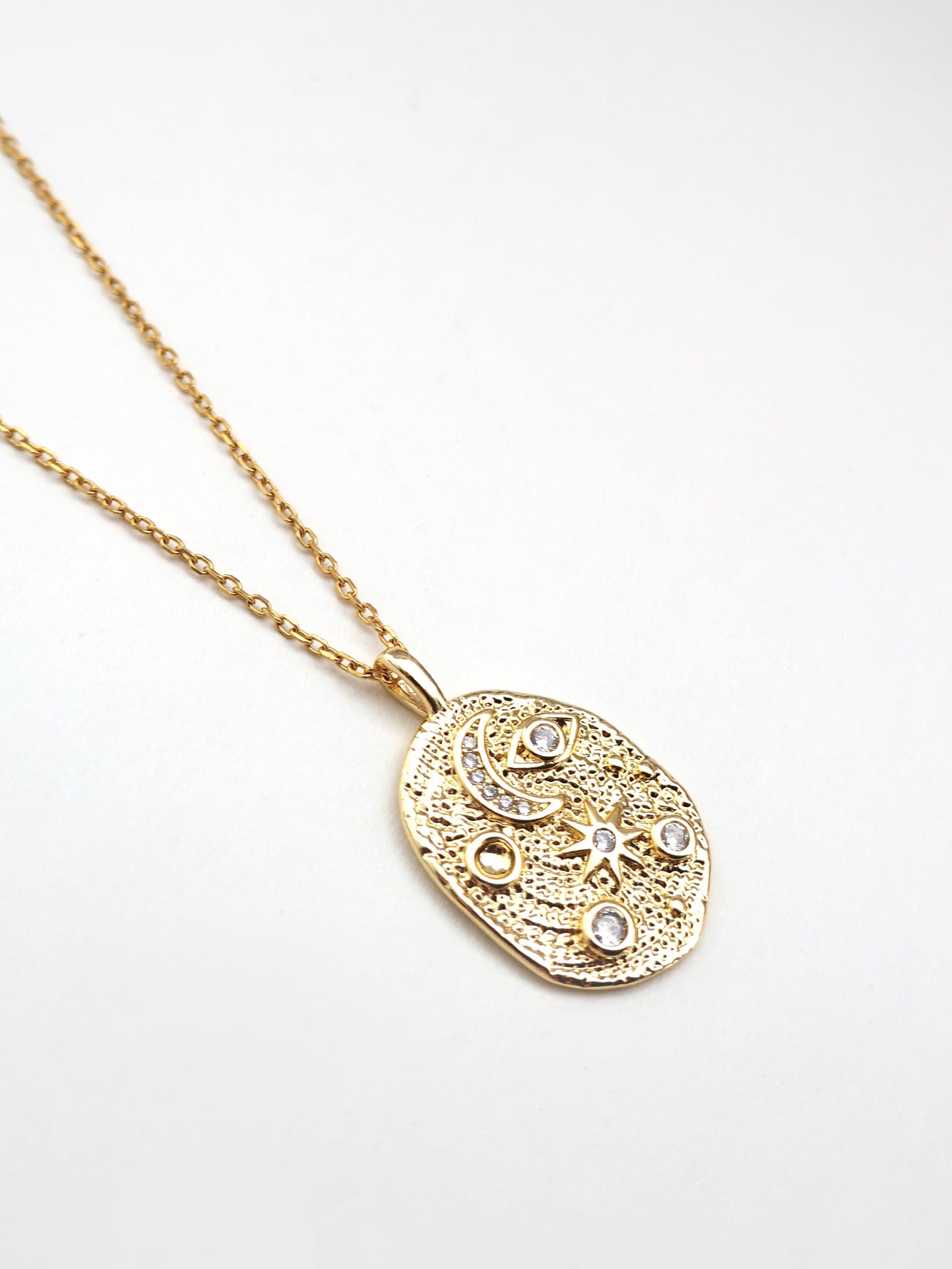 Close-up of the Natural Spiritual Symbols Charm Golden Necklace showcasing the fine craftsmanship and gold-plated charms